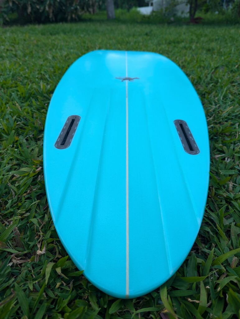 kauai_custom_surfboard_teal_airbrush_channels